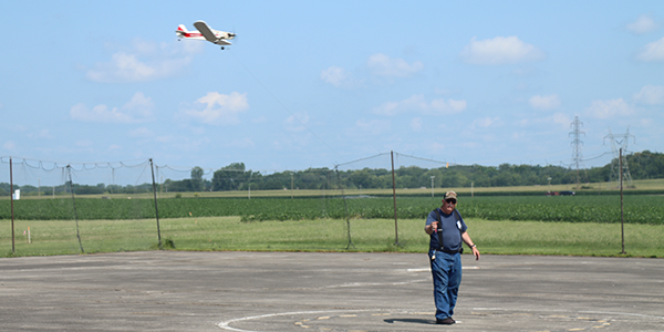 Dave Betz flying his 1/2a Scale Pawnee.