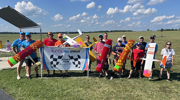 The 2024 AMA RC Pylon 424 Nats winners (L-R): Dan, Randy, Leo Nordell, Jim Allen, Larry Lisowski, Michael Deneve, Adam Oswald, G