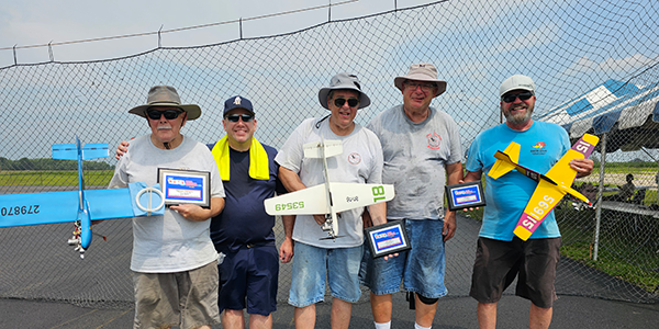 The Open Goodyear winners (L-R): Charles Barnes Sr., Charles Barnes Jr., Bill Bischoff, Mike Greb, and Doug Mayer.