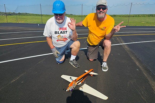 Mike Hazel and Doug Mayer’s team can still manage a smile after the loss of their bird in the DMAA Sport Goodyear Race.