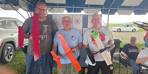 The 2024 TQR Winners: Mike Greb, Bob Oge, and the author.