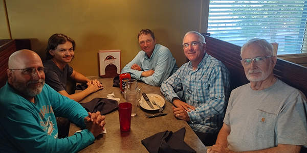 Counterclockwise: Jay Watkins, Jeff Shaw, Todd Anderson, Paul Martinez, and Gil Perez enjoying a night out before the start of t