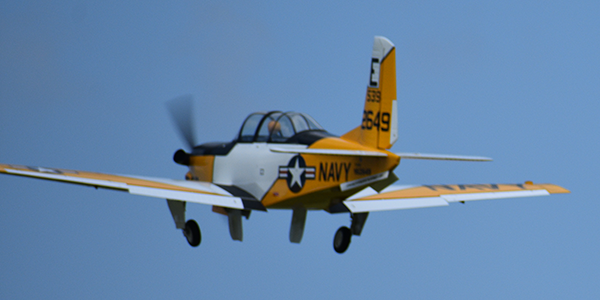 The T34C of Will Berenger retracting its gear on a climb out.