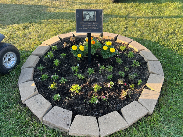 A few flowers were added to the already nice flower bed for Cliff and Nancy Telford!