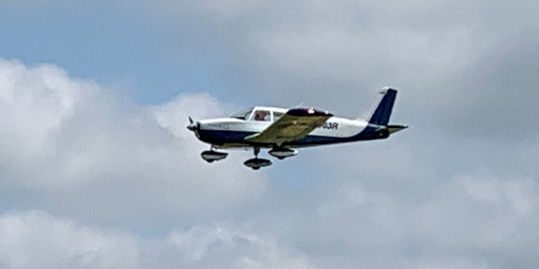 Mark Radcliff’s Piper Cherokee on a flyby.