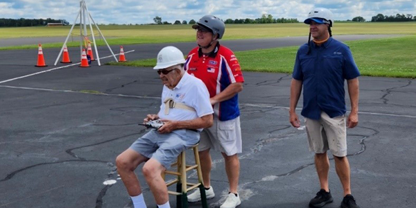 Bob Petrenic, who is 89 years old, with Dan and Jason Horvatis.