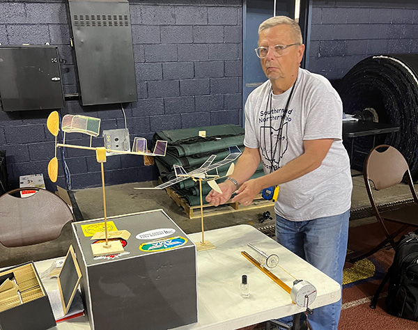 Tom Sova poses with his Mini Stick and A-6 models. Photo credit: Nick Ray