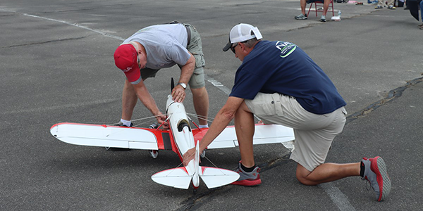 Allen Goff preparing his Ryan STA for a Fun Scale flight.