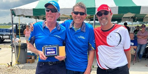 Mike (L) holding his third-place award, accompanied by Dub Jett and Doug (R).