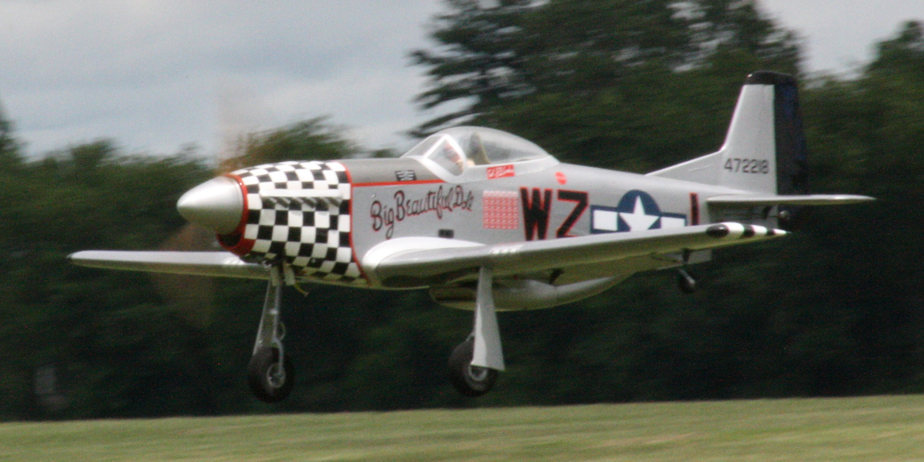 8.	One of several P-51s about to touch down. Alexander photo.