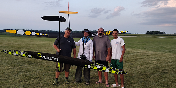 Gavin Trussell, Randy Everly, Steven Wilcox Sr., and Steven Wilcox Jr. practice the evening before the start of ALES on Site 5 o