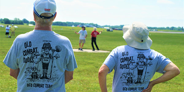 The pit crew wears their Old Combat Dudes T-shirts, which are the perfect attire for the lower-intensity Speed Limit event.