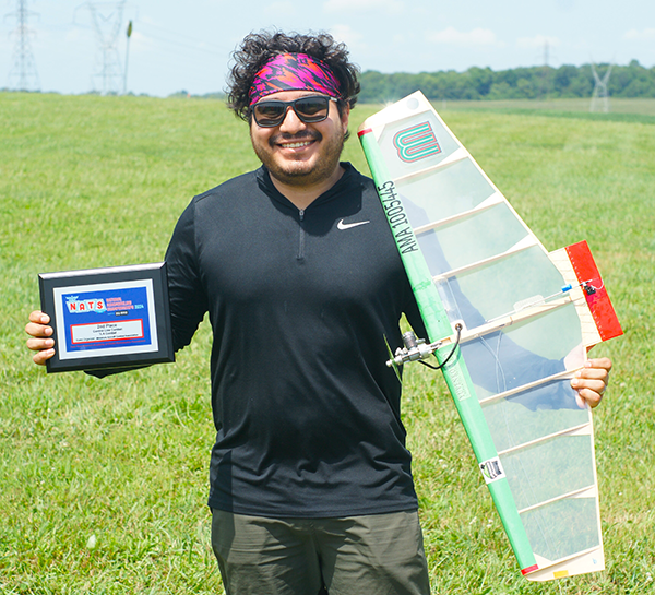 Ariel Quezada with a trophy and big smile to go with it. He was runner-up in 1/2A Combat.