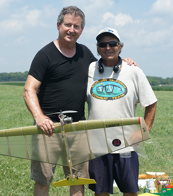 Chris Menicou (L) and Pete Athans pose with a model that has flappers. Chris was going over the 75-mph speed limit in his first 