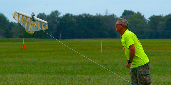 A little wind can make a launch interesting. Bill is prepared to chase down the model, should the shutoff trigger. No problem.