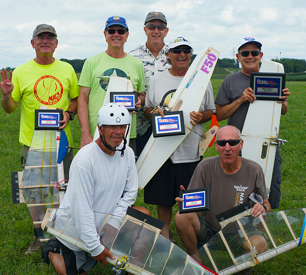 F2D Fast Combat winners (back row, L-R): Bill Maywald, fourth; Jerry Sabin, third; Event Director Dave Edwards; Pete Athans, sec