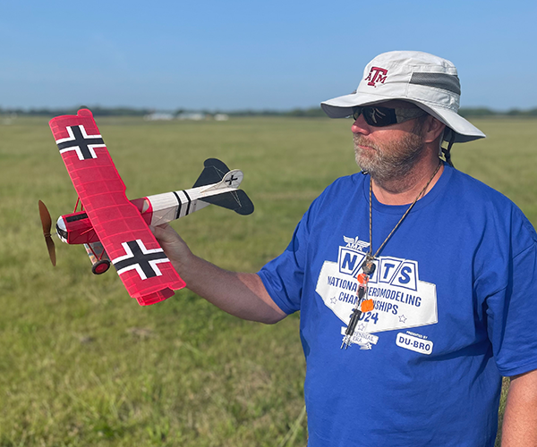 The author and his FAC model, a Fokker D.VII. It won FAC Rubber Scale.