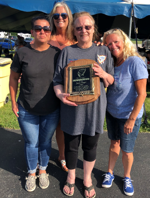 Joyce with her Hall of Fame plaque and her crew from AMA: Yolanda, Colleen, and Lois.