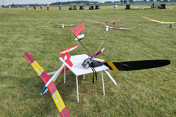 :] An interesting sailplane stand covering three of the four Quadfecta classes.