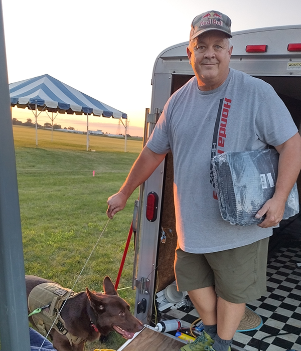 Gavin Trussell and Seven, from OH, get set up for their stay at the 2024 RC Soaring Nats.