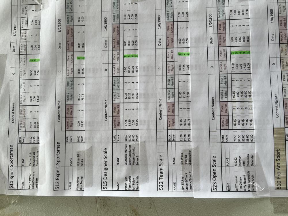 Spreadsheet with rows and columns, some numbers highlighted in green.
