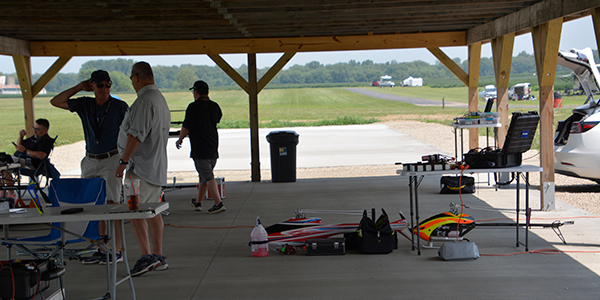 Pilots gathering and getting ready under the AMA pavilion.