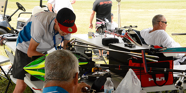 It is typical for pilots to check models out in the pit area.