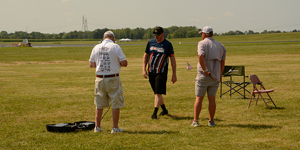 First-time Nats competitor Scott Graham helps the contest team with the sound system for an F3N Freestyle round.