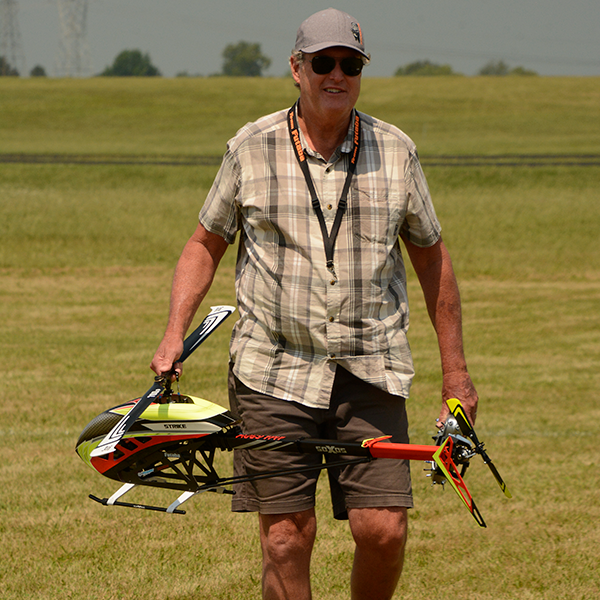 Longtime model helicopter competitor Cliff Hiatt is happy to have had a successful flight.