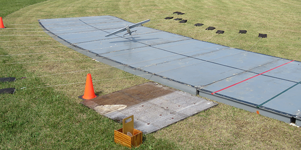 Pete Mazur’s Electric Class I airplane making a 100-point landing.