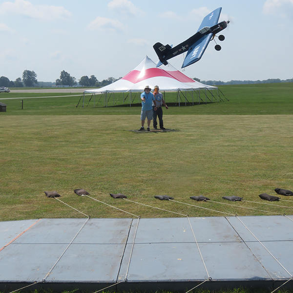 Evert Shoemaker’s Electric Profile airplane during the low-speed portion of the flight. Center Judge Bob Heywood can be seen jud