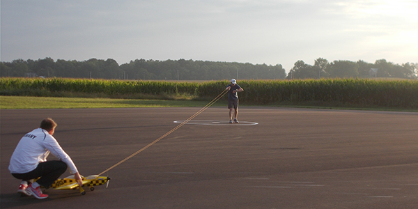 Mike Palko checking to see when his electric motor will start for an official flight.