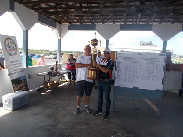 Orestes accepting the Walker Cup. 