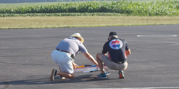 Orestes Hernandez getting ready for a winning flight, with Joe Gilber holding. Photo from 2022.