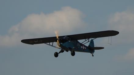 Mike McHenry’s Navy version of the Piper Cub flown in F4B.