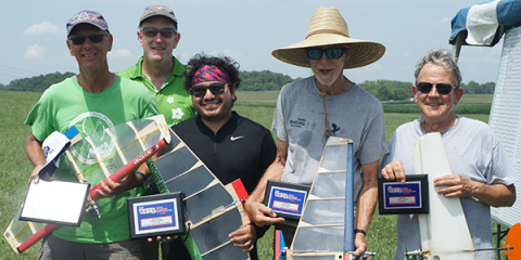 The 2024 1/2A Combat winners (L-R): Jeff Johnson, first; Event Director Dave Edwards; Ariel Quezada, second; Chuck Rudner, third; and Chris Gay, fourth.