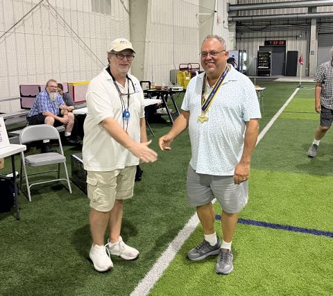 Dave Lindley presents Don Slusarczyk with the Cabin Award. Dave Lindley presents Don Slusarczyk with the Cabin Award.