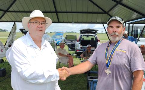 Pete Russell gets his silver medal in Unlimited.