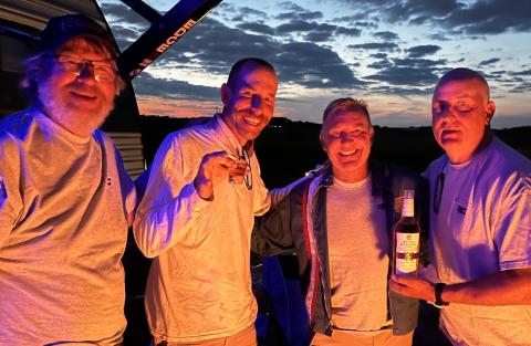 Evening happy hours in campground are almost more fun than the flying. (L to R): John Lorbiecki, Neal Menanno, David Hersuscjet.