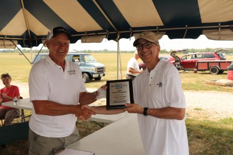 Peter Bauer with his Grand Champion award.