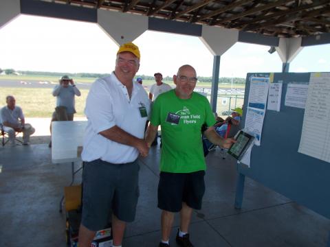 Leonard Bourel Getting his 1st place trophy from Micheal Scmidt.