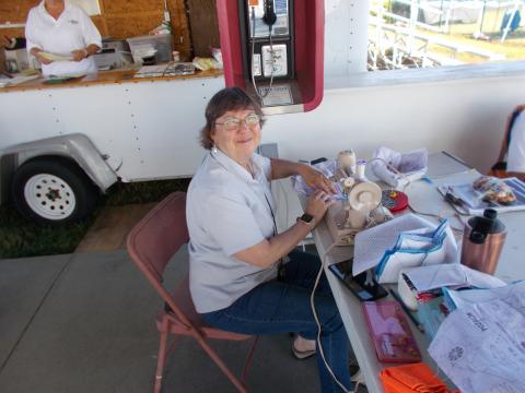 What do you do when your husband is out practicing? Why sew of course. Joan Cox and her hobby.